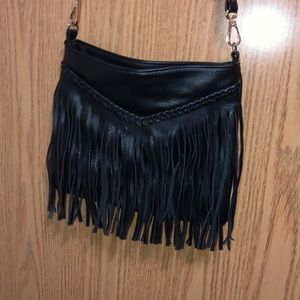 Faux leather cross body fringe bag